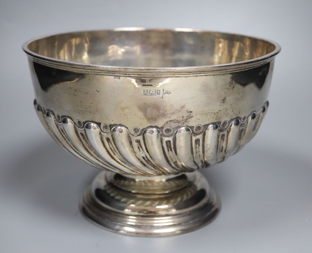 An Edwardian demi-fluted silver rose bowl, by Walker & Hall, Sheffield, 1901, diameter 20.5cm, 21.5oz.